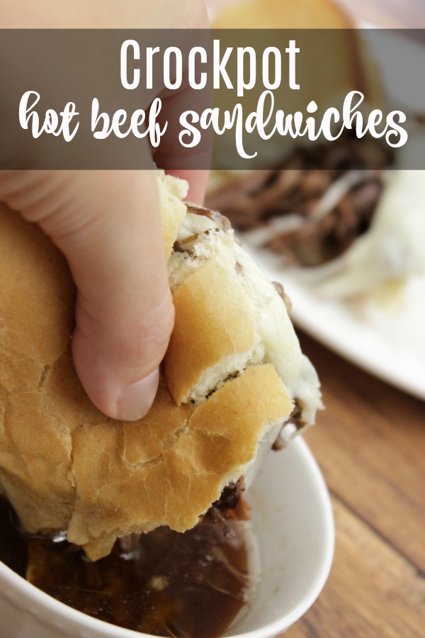 This hot beef sandwiches crockpot recipe will be a go to for those busy nights when you need something quick. They're a lot like a french dip, but with a different taste from the beer. #beef #crockpotdinner #beefcrockpot