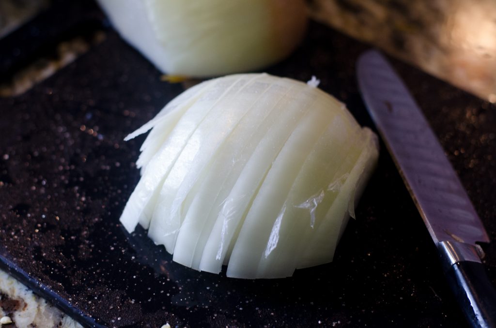 slicing the onion for the fajitas