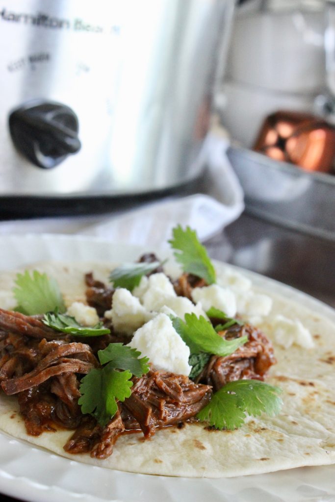 Beef street tacos are so easy and delicious! This my slow cooker shredded beef taco meat! 