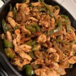 fajitas in a cast iron pan made at home